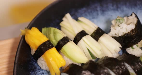 Platter Of Delicious Sushi Rolls And Nigiri Sushi. Traditional Japanese Cuisine. - close up - slidin