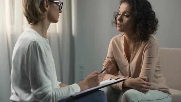Female Psychologist Listening Female Patient, Depression and Break-Up, Therapy