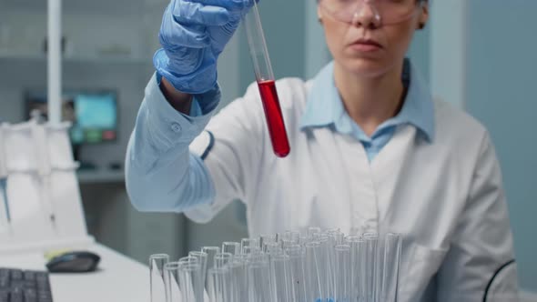 Microbiology Doctor Holding Test Tube Filled with Blood