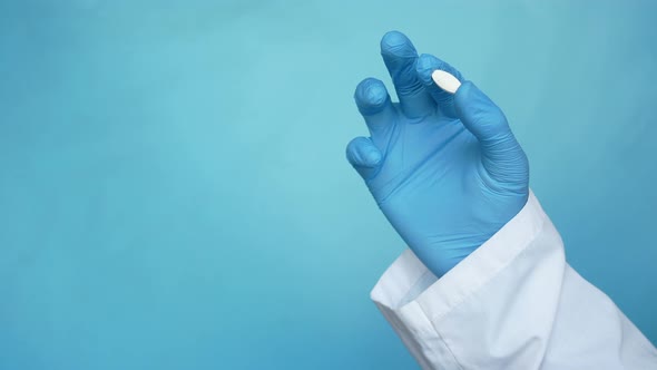 White Color Medical Pills on Hand