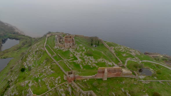 Aerial footage of the medieval castle ruin of Hammershus in Denmark, drone stock footage