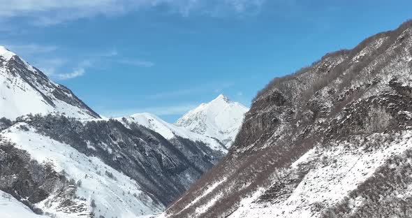 Aerial view of beautiful snowy mountains in Gudauri, Georgia