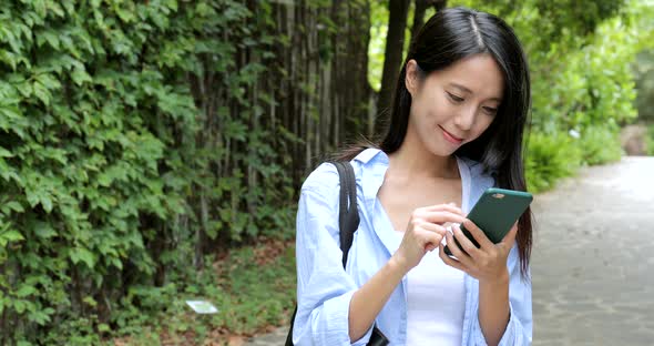 Young woman using mobile phone