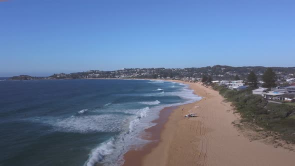 an ascending aerial shot of terrigal beach