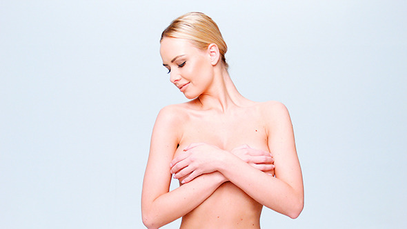 Young Naked Woman Cover Her Breast With Hands