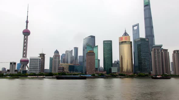 Shanghai River Urban Cityscape Aerial Skyline Panorama Timelapse at Day Zoom Out