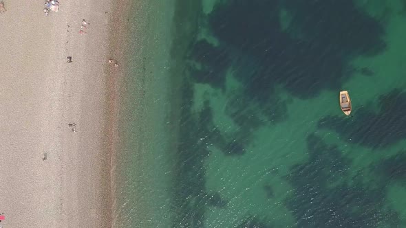Paradise beach, crystal clear water. Over head aerial view.