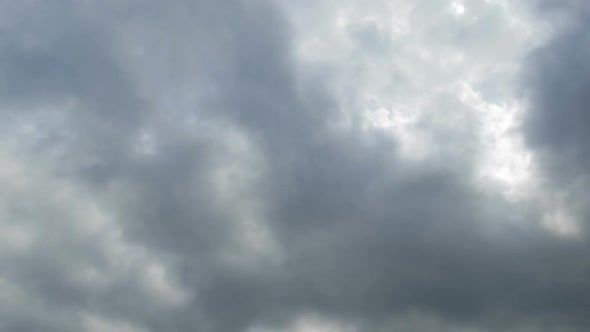 Gray Rain Clouds Are Moving in the Sky. TimeLapse