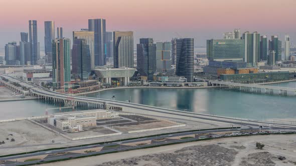 Aerial Skyline of Abu Dhabi City Centre From Above Day to Night Timelapse