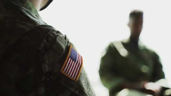 US soldier during a strategy meeting, united states armed forces background with copy space