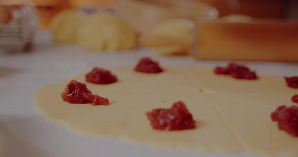 Woman Puts Fruit Jam on Dough Making Croissants Baking Pastries