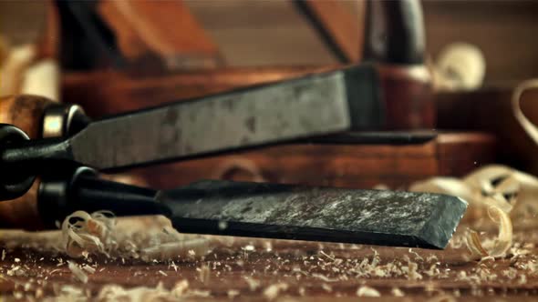 Chisels Fall on a Table of Sawdust