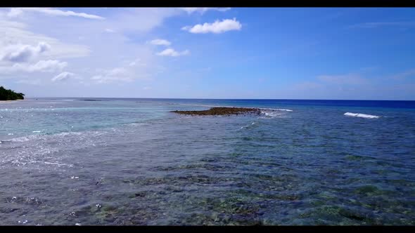 Aerial top down texture of beautiful tourist beach journey by shallow lagoon and white sand backgrou