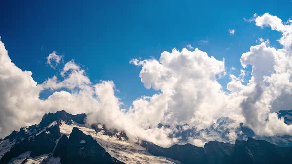 Snowy Mountain Against Cloudy Sky