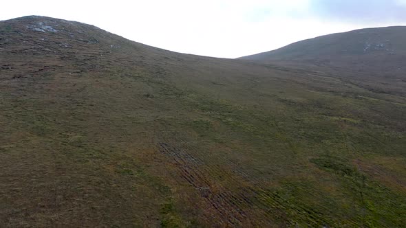 Aerial View of Cnoc an Stualaire Next to the Glenveagh National Park  County Donegal Ireland