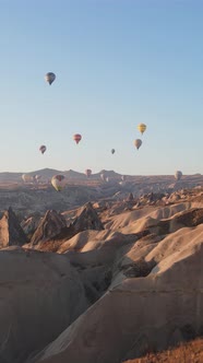 Vertical Video of Hot Air Balloons Flying in the Sky Over Cappadocia Turkey