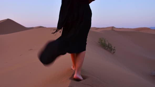 Woman Walk On Sand Background