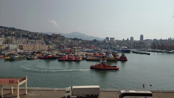 Port of La Spezia, Cinque Terre, Italy. Tugboat is moving out of its anchored to go out for a  job.