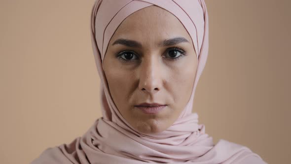 Close Up Face Young Girl in Hijab Traditional Headscarf Serious Muslim Woman Looking at Camera