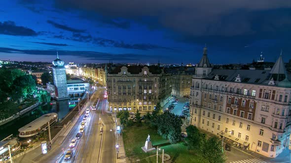 Sitkovska Watertower Night Timelapse and Traffic on Road in Old City Center of Prague