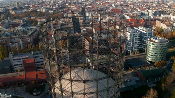 Big Metal Structure Gasometer in Berlin, Germany, Aerial Tilt Down High Angle View