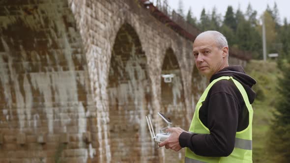 Drone Under a Bridge Doing an Inspection