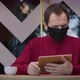 Handsome Man in Black Protective Mask Messaging and Chatting with Tablet in Cafe - VideoHive Item for Sale
