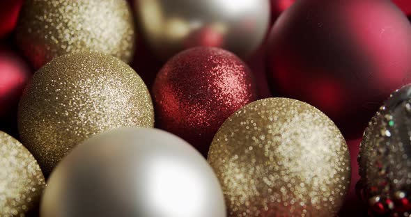 Beautiful Red and Gold Baubles on a Christmas Background