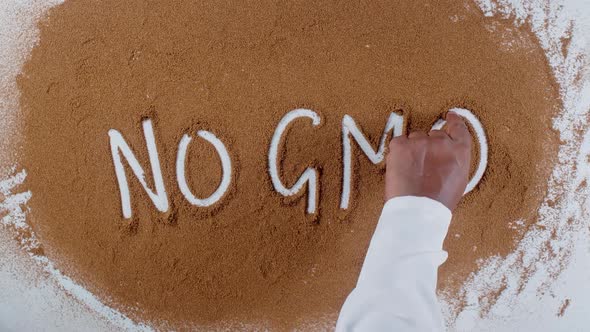 Hand Writes On Soil No Gmo