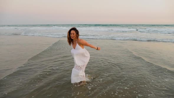 Beautiful Woman Enjoying The Beach