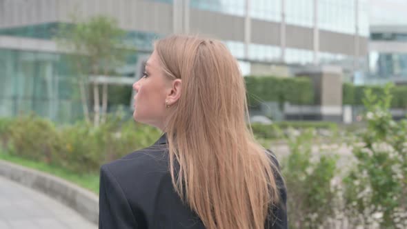 Close Up of Businesswoman Walking on the Street Back View