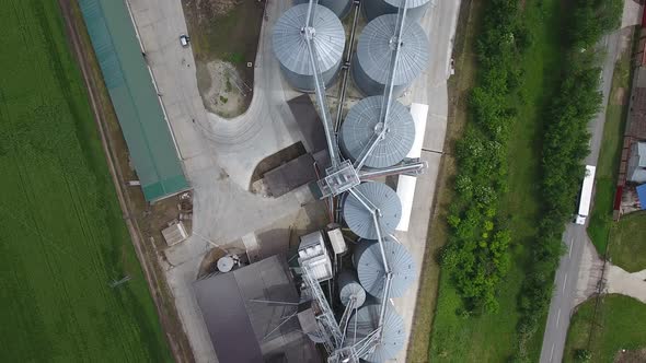 Silo And Truck On The Road