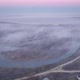 Drone Shot Flying Above Foggy Little Lake During Morning Sunrise in Late Autumn - VideoHive Item for Sale