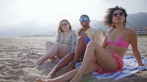 young women having fun on the beach