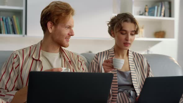 Happy Family Browsing Internet in Morning Closeup