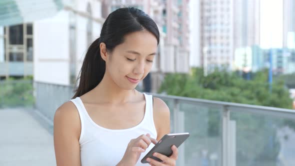 Young Woman using cellphone 