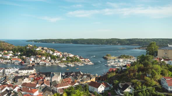 Time lapse in Kragero showing the boating activity along the marina; Norway