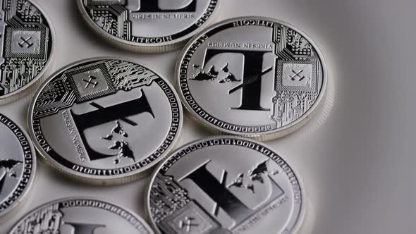 Rotating shot of Litecoin Bitcoins (digital cryptocurrency) - BITCOIN LITECOIN 0115