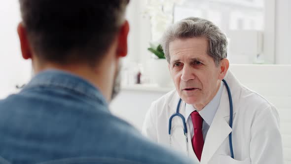 Man at a routine visit at his doctor. Shot with RED helium camera in 8K 