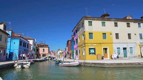 Panorama of Venice Canal and Cozy Colorful Houses, Tourists Walking in Burano