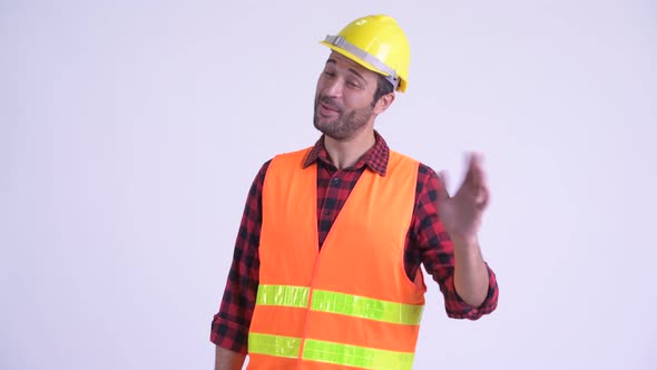 Happy Bearded Persian Man Construction Worker Waving Hand