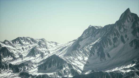 Aerial View of the Alps Mountains in Snow