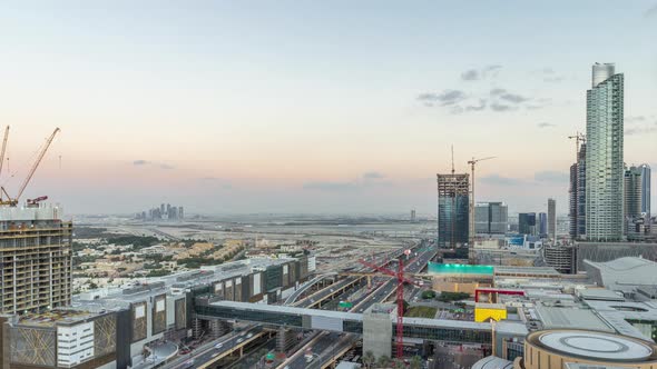 Aerial View of Financial Center Road Day to Night Timelapse with Under Construction Building