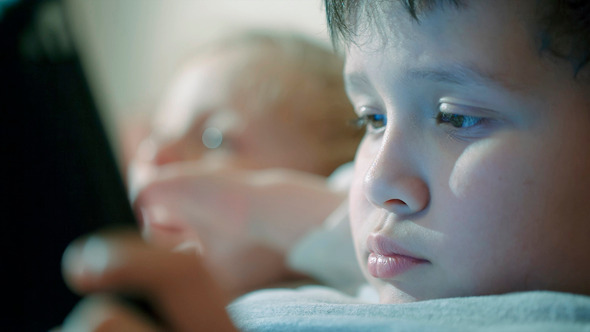 Close-Up Shot Of Two Boys