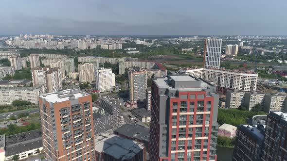 Aerial view of new modern high-rise buildings and old panel houses 05