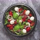 Salad with Traditional Italian Mozzarella Cheese with Arugula and Tomatoes on Dark Concrete Table - VideoHive Item for Sale