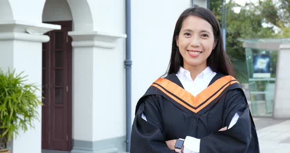 Asian woman get graduation in university campus