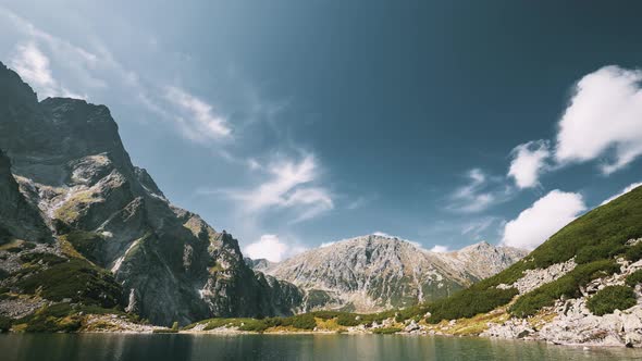 Tatra National Park, Poland. Calm Lake Czarny Staw Under Rysy And Summer Mountains Landscape