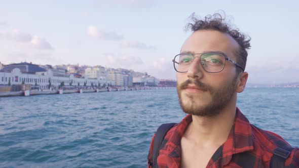 Young man on the ferry at sea.