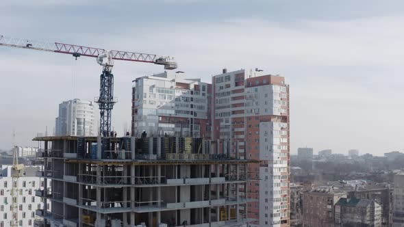 Panorama of the Construction of a New High-rise Building for People To Live. Aerial Shot of a alt